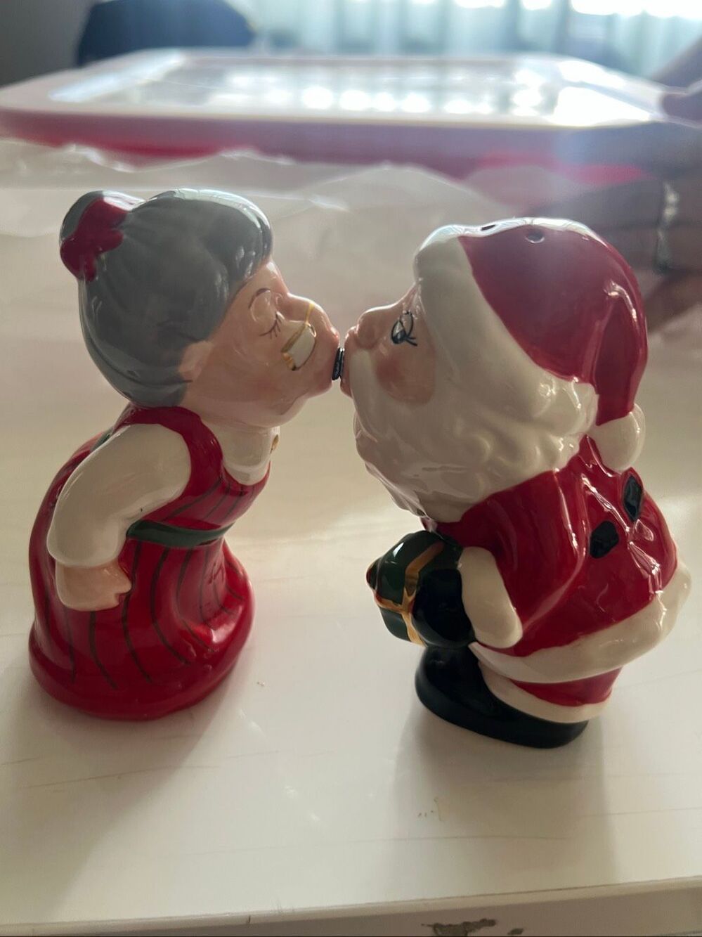 Ceramic Multicolor Santa And Mrs Claus Kissing Salt & Pepper Shaker Set
